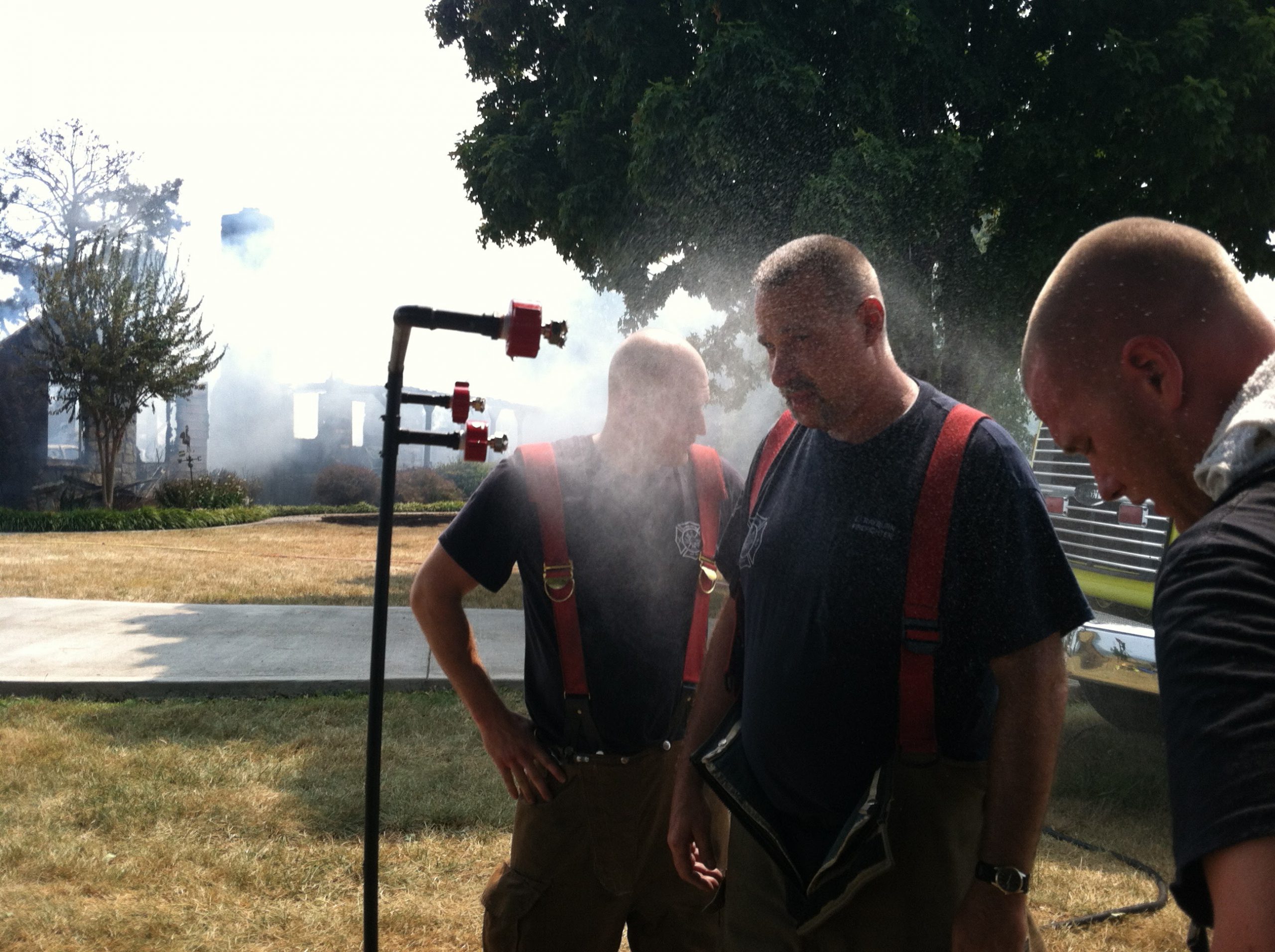 rehab cap with misting nozzles to cool firefighters